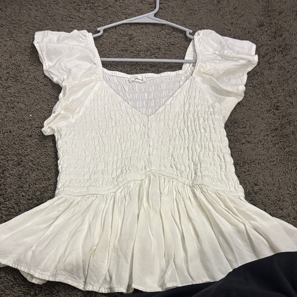 Chic White Smocked Blouse with Ruffled Sleeves